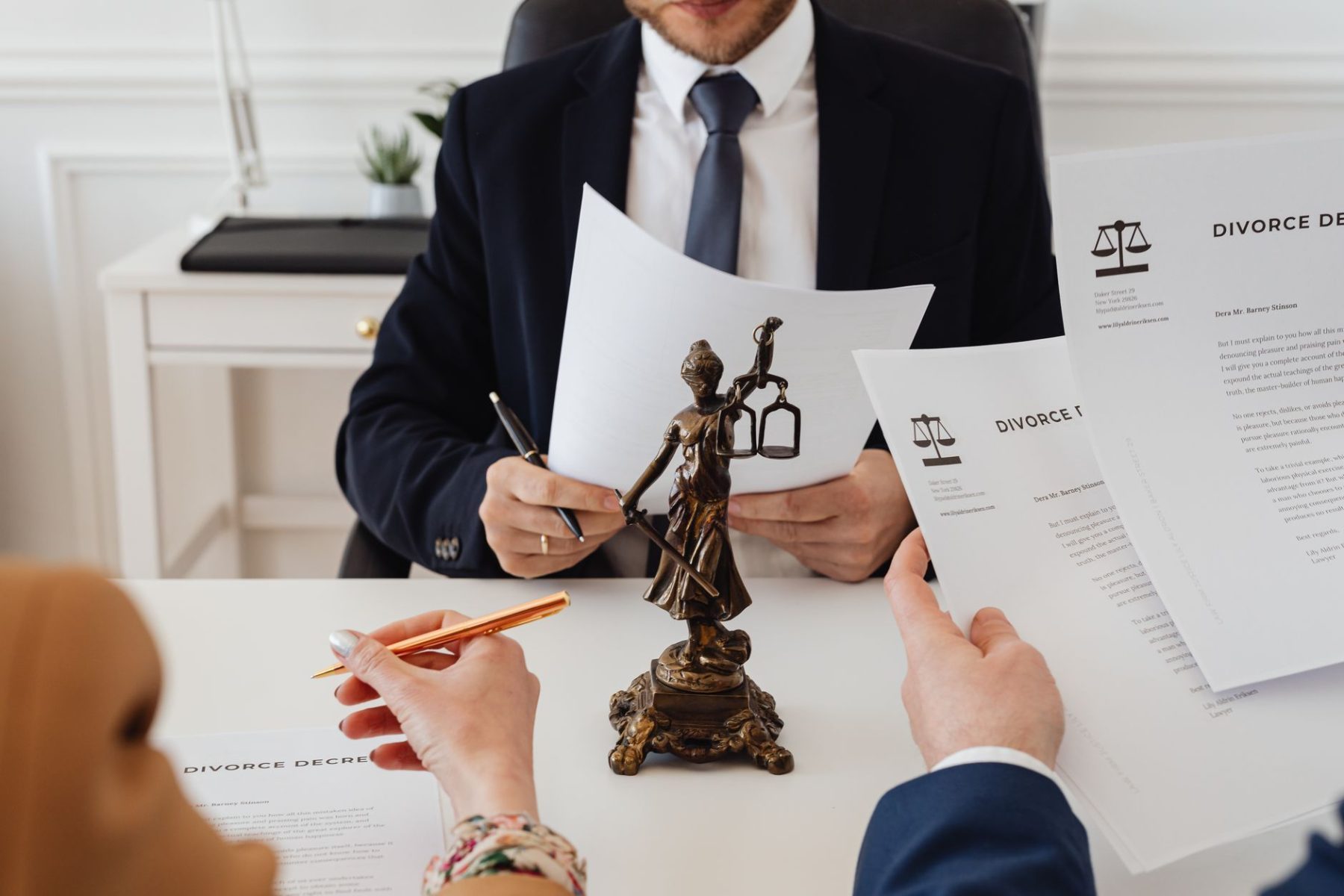 Lawyer reviewing documents related to filing for divorce